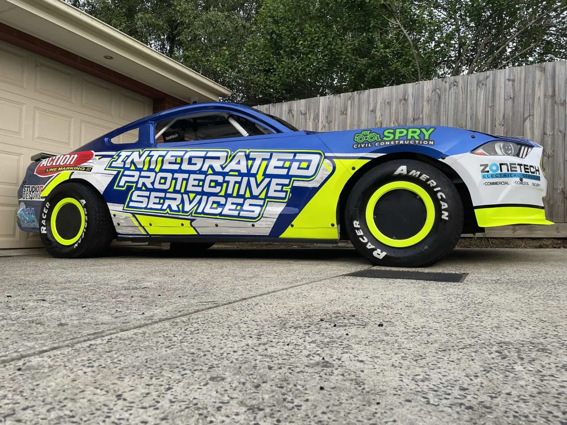 Williams Race Tech #32 Ford Mustang Modified Sedan full side profile showing the livery